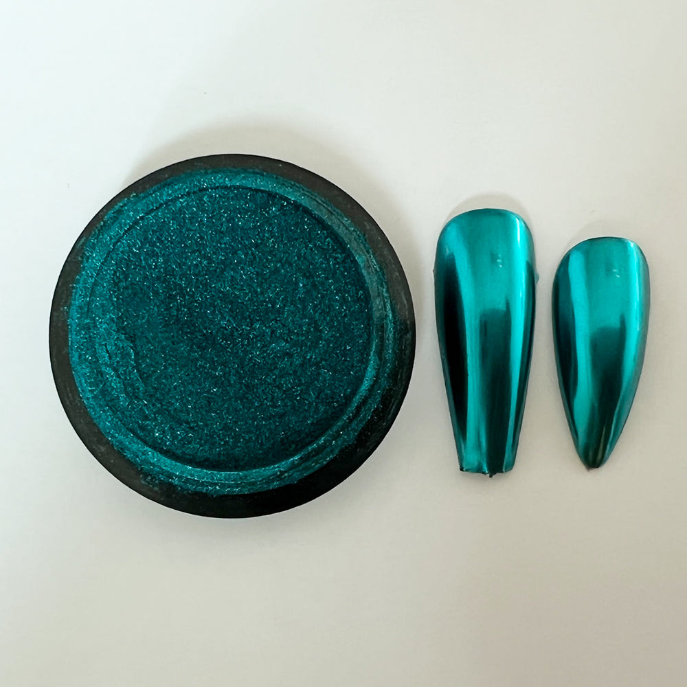 CP-DS01 Mirror Teal Pigment Powder & nails painted with the pigment used in a nail paint blend. Not approved for cosmetic use, but OK for nail applications. Available in 2g Sample & 30g sizes.
